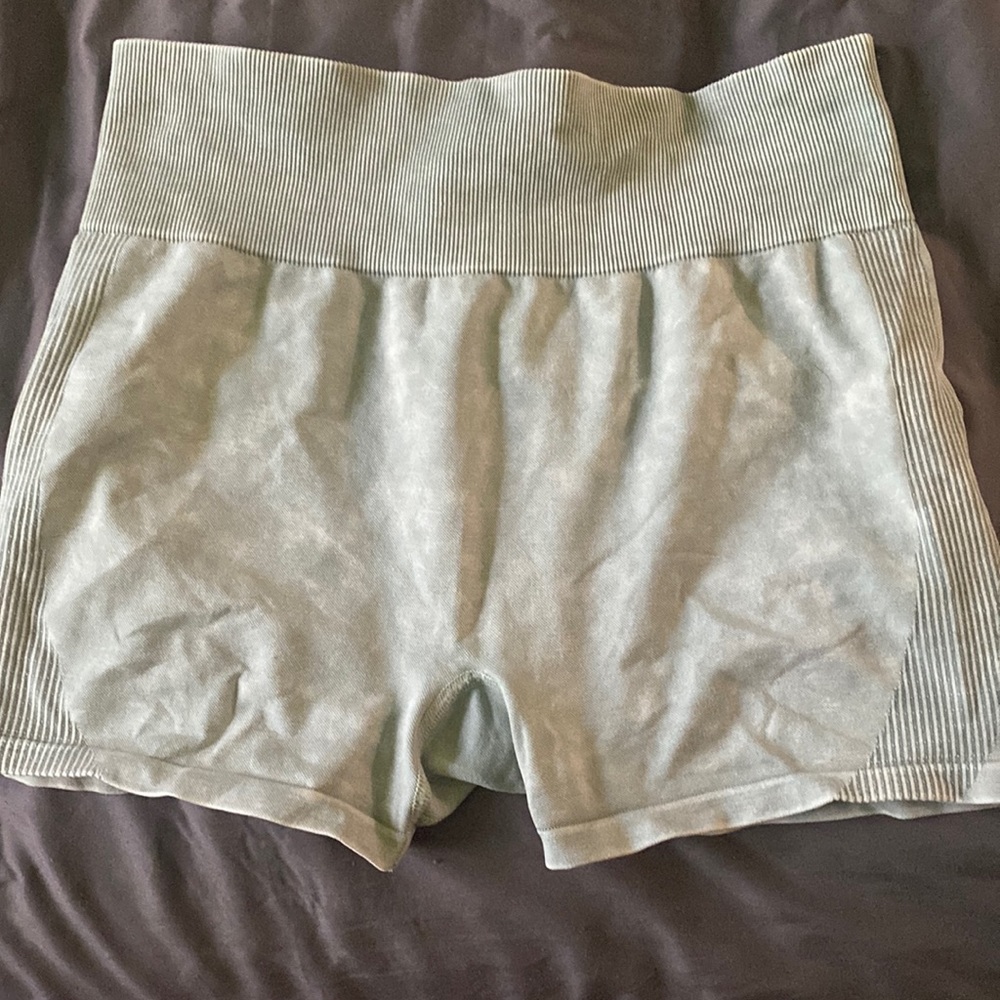 Victoria Secret Light green biker shorts.